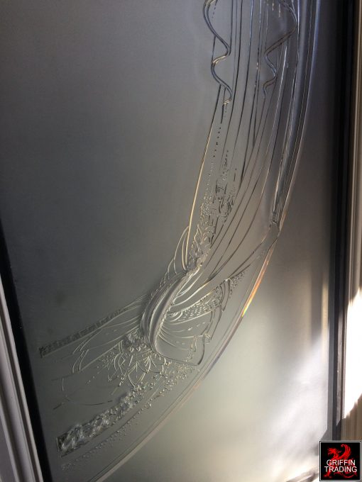 Etched glass panels from a women's boutique.