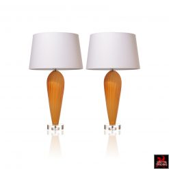 Pair of Citrine color glass table lamps With white linen shades.