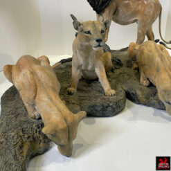 Pride of the Serengeti bronze sculpture by Karl Lansing.