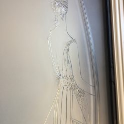 Etched glass panels from a women's boutique.