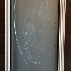 Etched glass panels from a women's boutique.