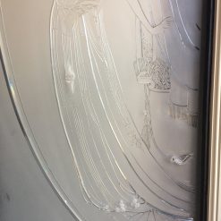 Etched glass panels from a women's boutique.