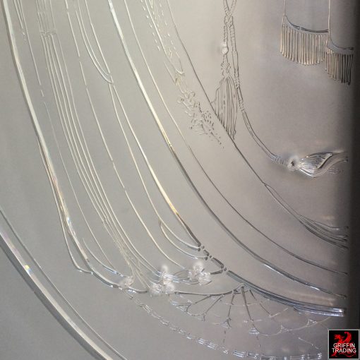 Etched glass panels from a women's boutique.