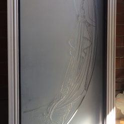 Etched glass panels from a women's boutique.